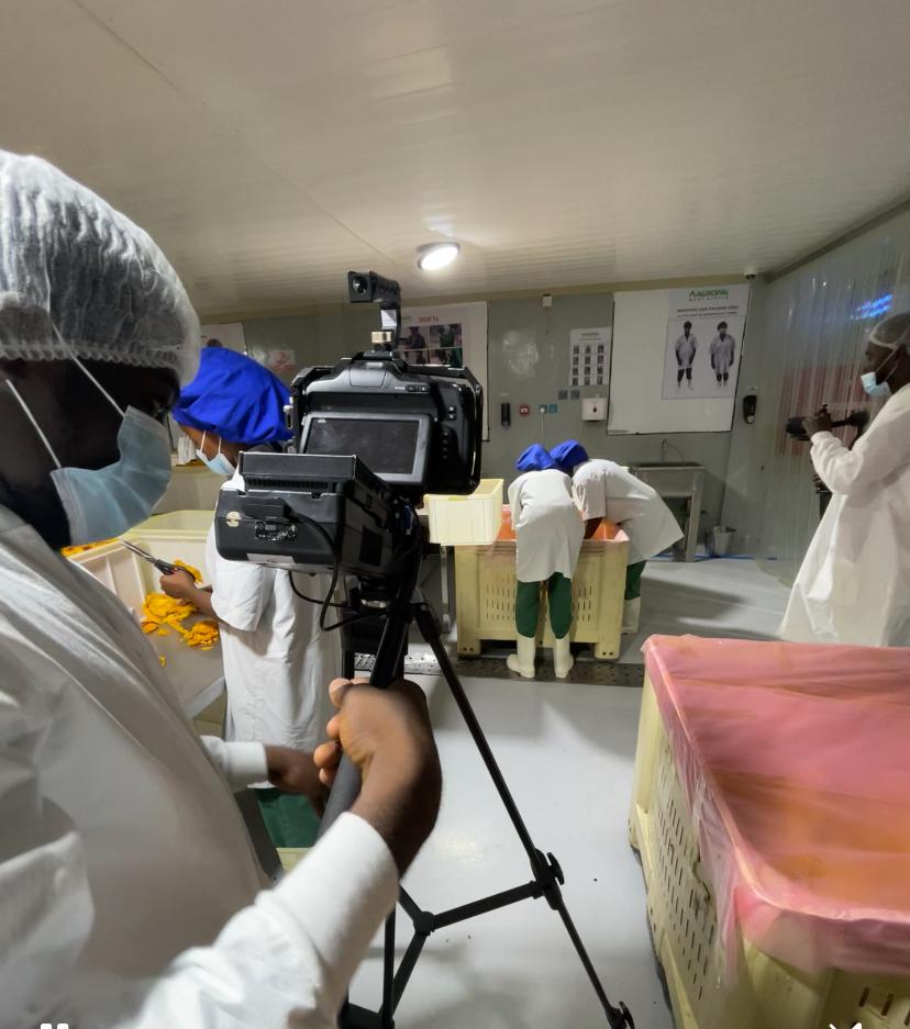 Video production team at a Factory